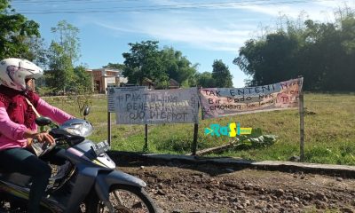 Lapangan Bola Voli Rusak Oleh Pengurugan, Pemuda Desa Terung Protes Dengan Memasang Spanduk.